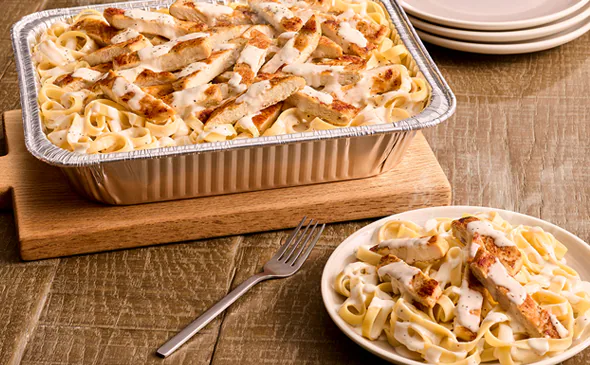 Chicken Alfredo family-size pan from Olive Garden menu for sharing