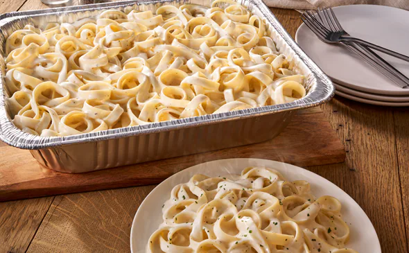 Fettuccine Alfredo family-size pasta from Olive Garden menu large portion