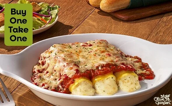 Four cheese manicotti pasta with marinara sauce from Olive Garden menu baked Italian dish