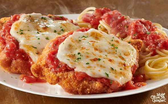 Grilled Chicken Parmigiana with melted cheese marinara sauce and herbs