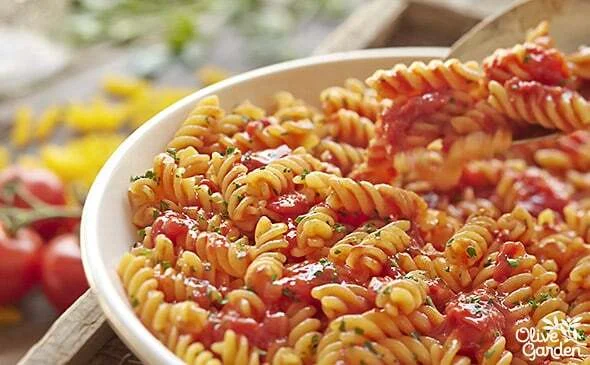 Rotini pasta with marinara sauce in a rich tomato base
