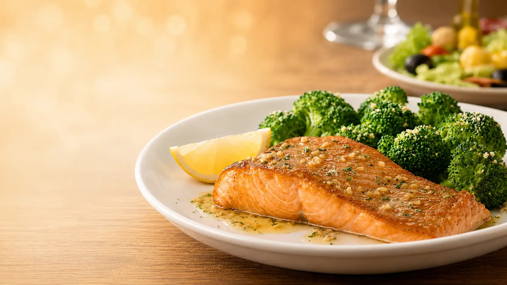 Herb-grilled salmon fillet with garlic herb butter and parmesan broccoli at Olive Garden